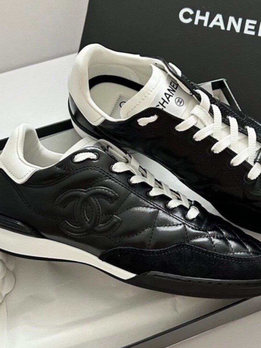 CHANEL Black Patent Quilted Leather Low Top Sneakers